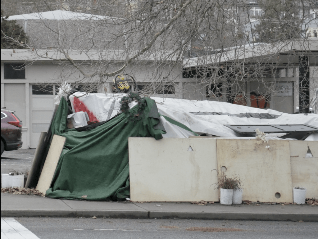 Photo of a homeless tent set up in the city of Seattle.